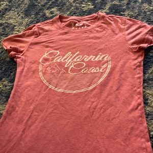 a red tee with print